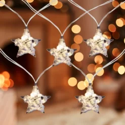 Northlight 10 B/O LED Warm White Clear Star And Yarn Christmas Lights - 4.5' Clear Wire