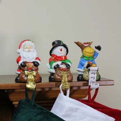 Northlight Santa, Snowman And Reindeer Christmas Stocking Holders - 5.25" - Set Of 3 4 Northlight Santa, Snowman And Reindeer Christmas Stocking Holders - 5.25" - Set Of 3 - Image 2